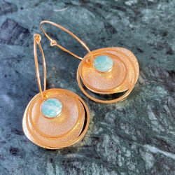 Boucles d'oreilles serties avec des anneaux