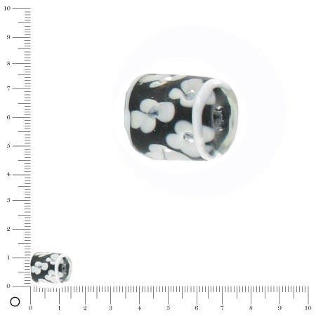 Perle en verre cylindrique fleur noir et blanc - L. 13 mm